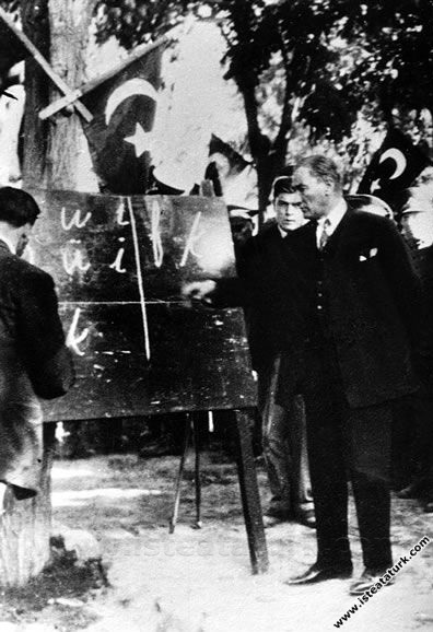 Mustafa Kemal Atatürk teaching the new letters to the citizens at the blackboard in Kayseri. (20.09.1928)